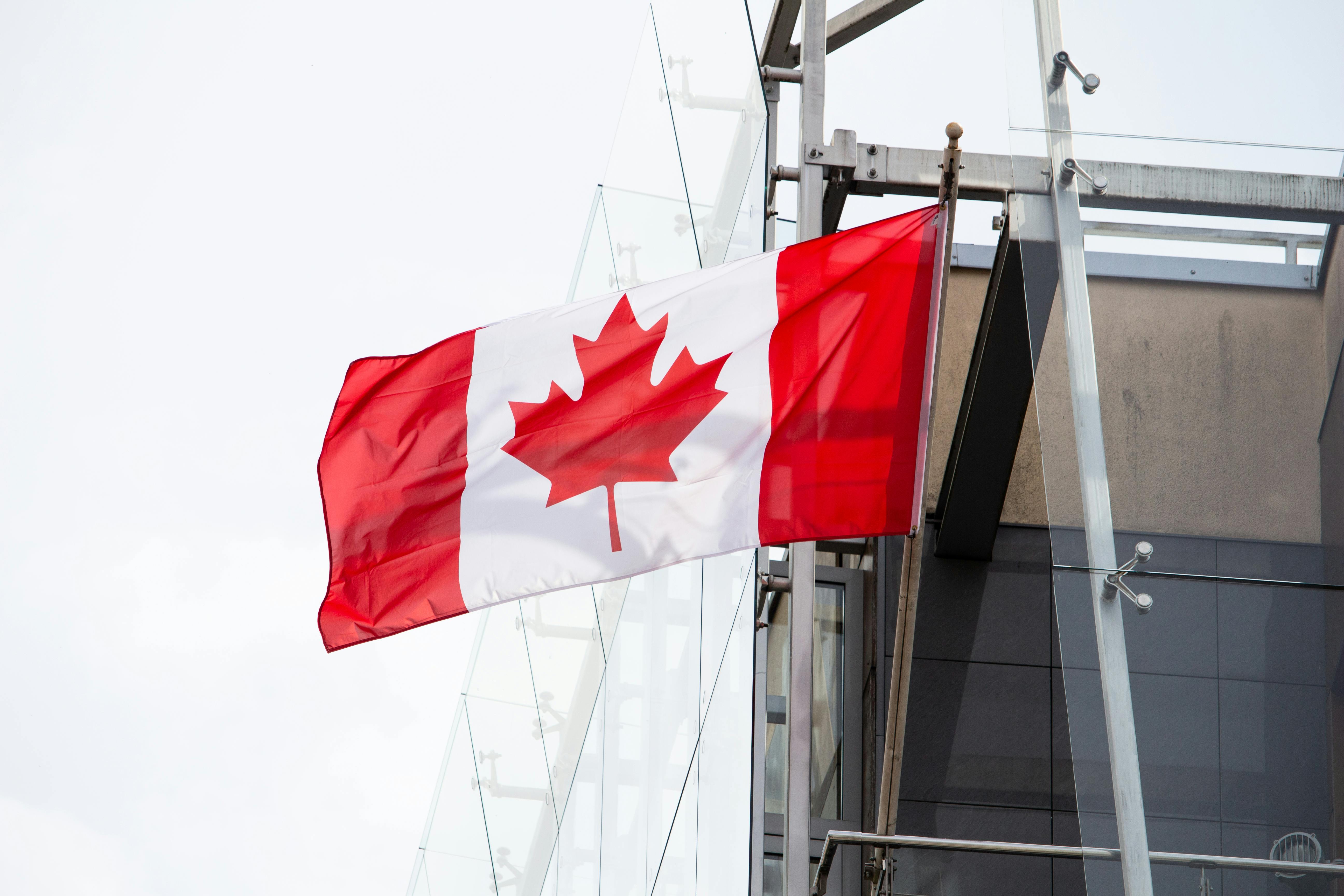 canadian flag blowing in the wind