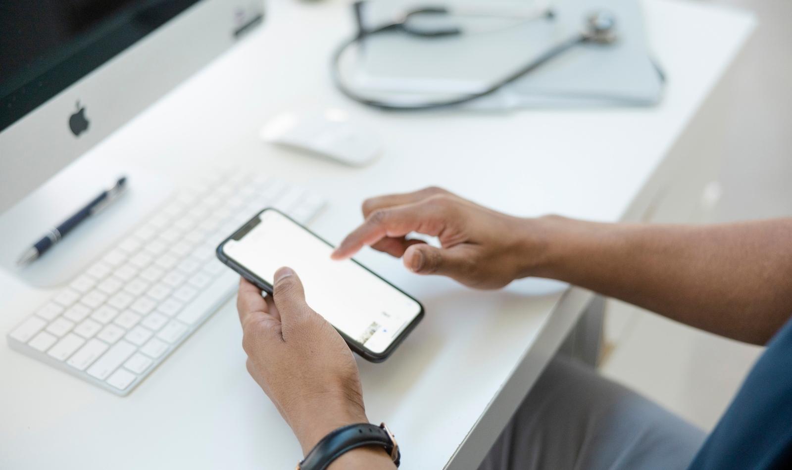 A physician entering billing information for their patient into the Dr. Bill mobile app.