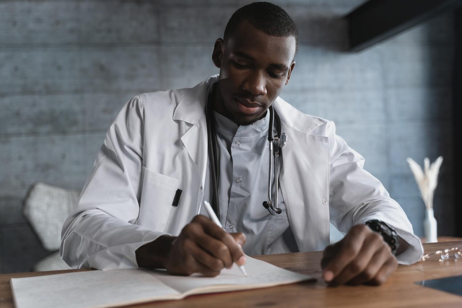 Doctor working on medical billing paperwork