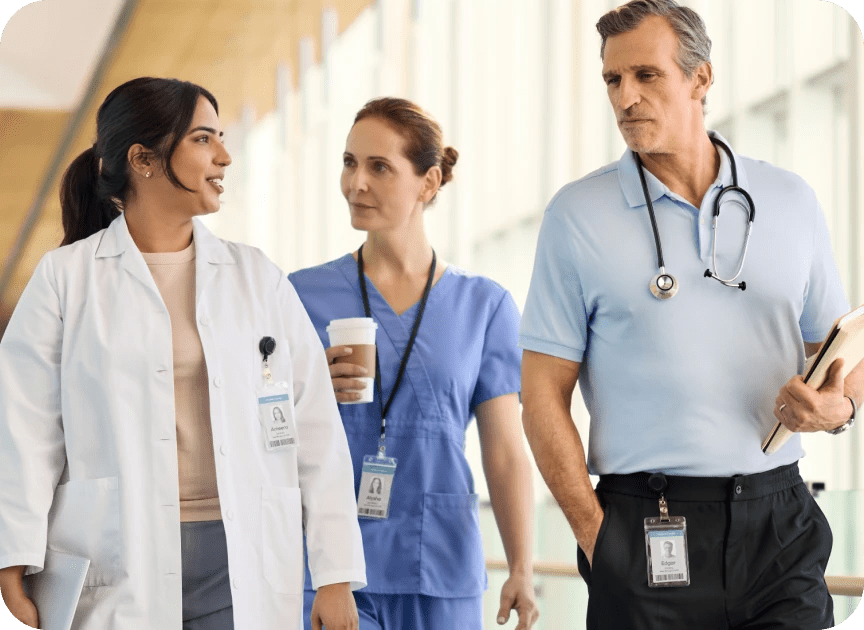 Group of physicians discussing in hospital