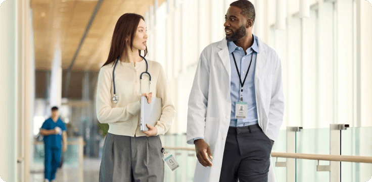 Two physicians discussing in hospital