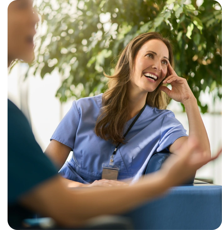 Physician discussing with coworkers